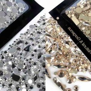 Strasuri pietricele cristale diverse forme si marimi doua nuante 150 buc.